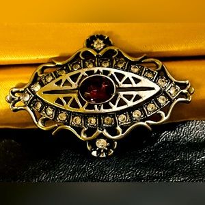 Vintage Brooch Center Amethyst surrounded by 25 Crystal Rhinestones Silver-tone.